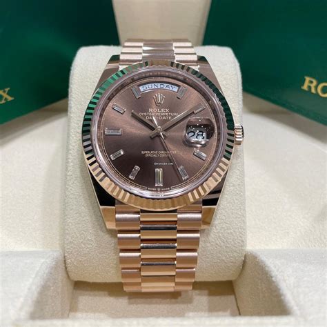 rolex day date 40 rose gold sundust dial|platinum day date 40 price.